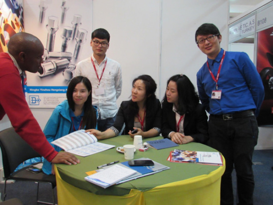 Chinese company representatives at a trade show in Nairobi. (Photo/China Daily)