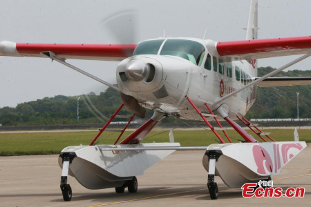 A Cessna 208B EX amphibian begins service after a commencing ceremony in Zhoushan city, East Chinas Zhejiang province, May 20, 2015. The plane of AVIC Joy Air general aviation airliner in Zhoushan is the first in China to launch a charter tourism flight with a seaplane, linking Putuoshan airport in Zhoushan to Shengsi Islands. (Photo: China News Service/Mou Jianwei)