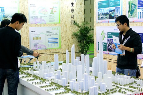 A model of a green building on display at an expo in Nanjing, capital of Jiangsu province. Beijing and Shanghai each have nearly 20 million sq m of green building space, taking the top two positions in the ranking of global green buildings. Photo/China Daily
