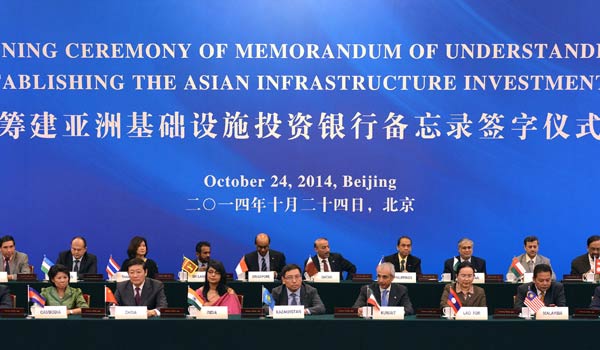 The signing ceremony of memorandum of understanding on establishing the Asian Infrastructure Investment Bank (AIIB) is held in Beijing, Oct 24 2014. (Photo/Xinhua)