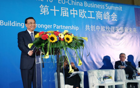Chinese Premier Li Keqiang delivers a speech during the European Union (EU)-China Business Summit in Brussels, Belgium, June 29, 2015. President of the European Commission Jean-Claude Juncker also attended the summit. (Photo: Xinhua/Yao Dawei)