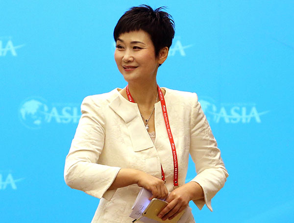 Li Xiaolin, newly-appointed vice-general manager of China Datang Corp, attends a seminar at the 2015 Bo'ao Forum for Asia in Hainan province in this March 29, 2015 file photo. (Photo by Wu Zhiyi/Asianewsphoto)