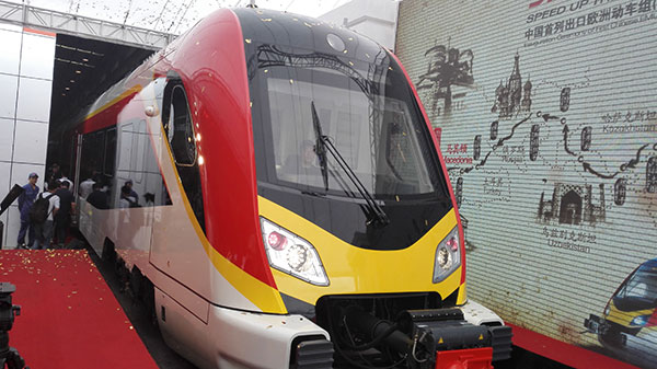 The first electric multiple unit train produced for Macedonia by a subsidiary of the China Railway Rolling Stock Corp sports the colors of the Balkan country's flag as it awaits delivery. (Photo/China Daily)