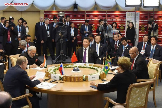 Chinese President Xi Jinping meets with Russian President Vladimir Putin and Mongolian President Tsakhiagiin Elbegdorj at the second trilateral meeting in Ufa, Russia, July 9, 2015. (Photo: Xinhua/Zhang Duo) 