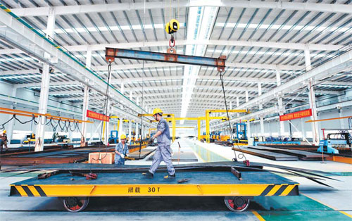 Zhanjiang Far East Steel Structure started trial production in early June and will export products to Indonesia in mid-July. Provided to China Daily