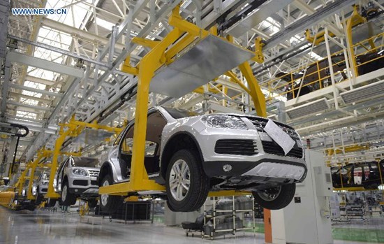 Photo taken on June 15, 2015 shows a motorcar production line in Sichuan Yema Automobile Co., Ltd in Chengdu, capital of southwest China's Sichuan Province. (Photo: Xinhua/Xue Yubin) 