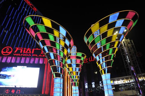 Dalian Wanda Group Co Ltd, the commercial real estate giant, last month launched an online crowdfunding project to fund new malls, which generated an Internet buzz. (Photo/China Daily)