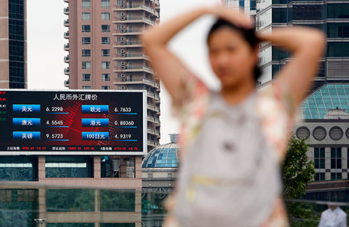 An information board showing foreign exchange rates in Shanghai. Despite the economic uncertainties associated with the devaluation of the Chinese currency, the exports sector could see a healthy uptick in the long term, a commerce ministry official said on Wednesday. (Yin Liqin/China Daily)
