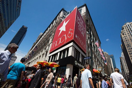Pedestrians walk through Herald Square past a Macy's Inc department store in New York.(Photo provided to China Daily)