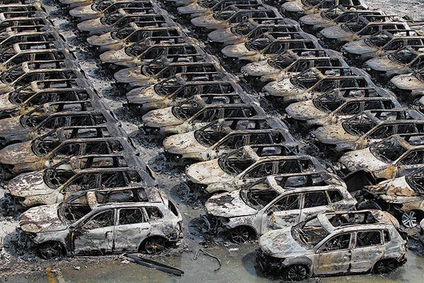 Scenes of the damage caused by the explosions in Tianjin port. (Zhu Xingxin / China Daily)