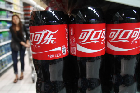 Coca-Cola products are seen for sale at a supermarket in Xuchang, Hennan province, May 26, 2013.(Photo/Asianewsphoto)