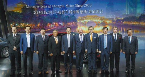 Mercedes-Benz executives and dealer partners at the Chengdu Motor Show on Friday. (Photo provided to China Daily)