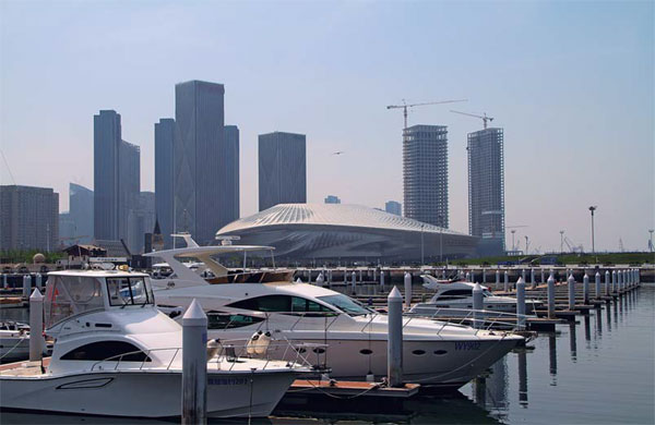 Donggang Business District, which is still under construction, is playing a key role in building Dalian into an international shipping, financial and trade center in Northeast Asia. (Photo provided to China Daily)