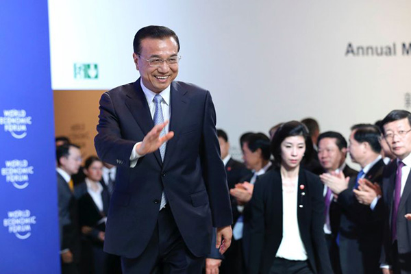 Chinese Premier Li Keqiang speaks with global corporate leaders at the Annual Meeting of the New Champions of the World Economic Forum in Dalian, Liaoning province on September 9, 2015. (Photo provided to China Daily)