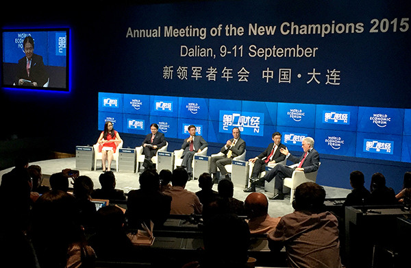 A forum on the yuan's exchange rate fluctuations is held on Thursday during the Summer Davos in Dalian, Liaoning province. (Photo/China Daily)