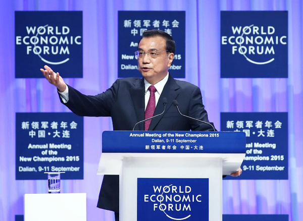 Chinese Premier Li Keqiang addresses the opening ceremony of the annual meeting of the New Champions, also known as the Summer Davos Forum, in Dalian, northeast China's Liaoning Province, Sept. 10, 2015. (Xinhua/Yao Dawei)