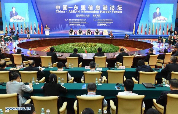Participants attend the opening ceremony of China-ASEAN Information Harbor Forum in Nanning, capital city of south China's Guangxi Zhuang Autonomous Region, Sept. 13, 2015. The two-day forum seeks to strengthen cooperation between governments, companies, and scholars in the fields of e-commerce, Internet security and cultural industries. (Photo: Xinhua/Zhou Hua)