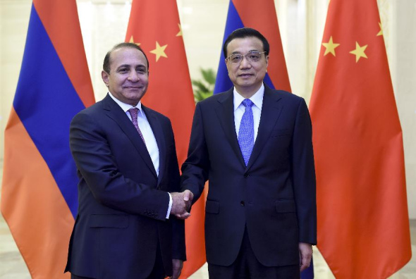 Chinese Premier Li Keqiang (R) meets with Armenian Prime Minister Hovik Abrahamyan, in Beijing, capital of China, Sept. 22, 2015. (Photo: Xinhua/Zhang Duo)