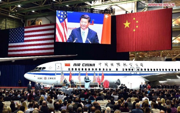 Chinese President Xi Jinping addresses a welcome ceremony held by Boeing Company during his visit to the Boeing Company's commercial airplane factory in Everett of Washington State, the United States, Sept. 23, 2015. (Photo: Xinhua/Li Tao)