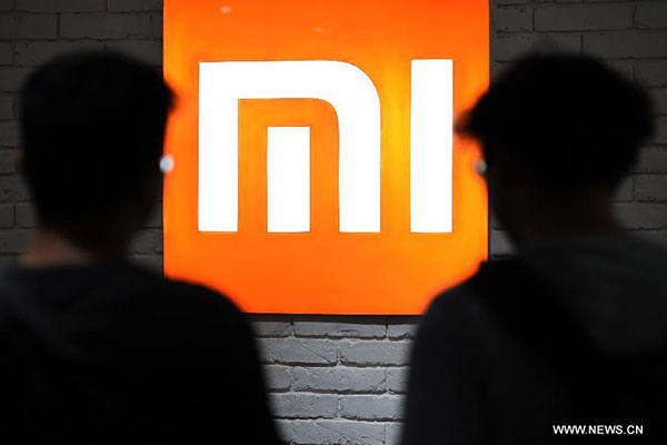 Reporters visit the first Xiaomi store opened in Taipei, China's Taiwan, Aug 6, 2015.(Photo/Xinhua)