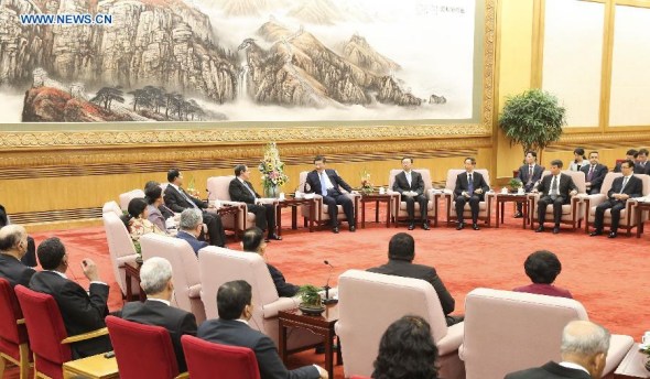 Chinese PresidentXi Jinpingmeets with foreign representatives attending the Asian Political Parties' Special Conference on the Silk Road in Beijing, China, Oct. 15, 2015. (Photo: Xinhua/Huang Jingwen)  
