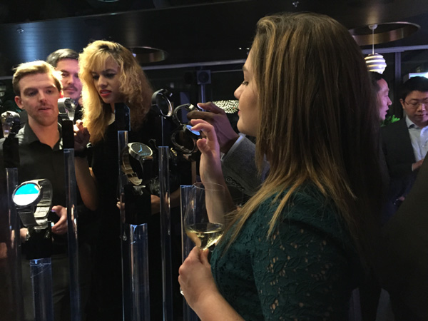 Hua Wei launches the stylish watch in the UK on Wednesday night. (Photo by Zhang Chunyan/chinadaily.com.cn)