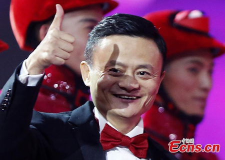 Jack Ma, founder and chairman of China's e-commerce giant Alibaba, interacts with customers through TV during the Tmall 2015 Singles Day Carnival Night at the National Aquatics Center in Beijing, capital of China, Nov. 10, 2015. (CNS photo/Han Haidan)