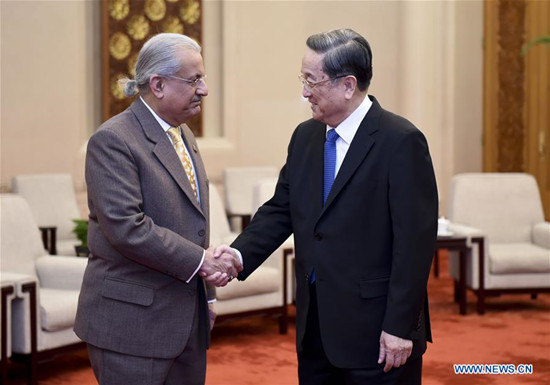 Yu Zhengsheng (R), chairman of the National Committee of the Chinese People's Political Consultative Conference, meets with Chairman of the Pakistani Senate Mian Raza Rabbani in Beijing, capital of China, Nov. 20, 2015. (Xinhua/Zhang Duo) 