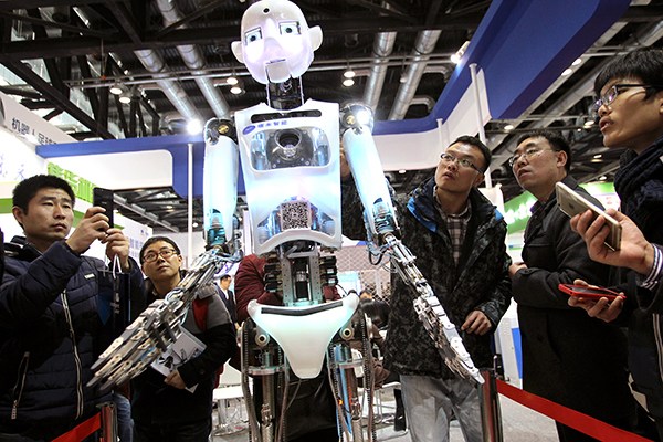 A robot made in China is displayed at the World Robot Conference 2015, which opened in Beijing on Nov 21, 2015. The conference has attracted more than 100 experts. (Photo/China Daily)