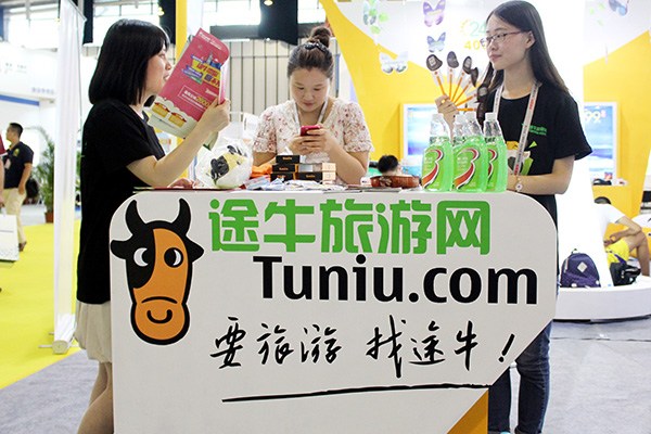 A Tuniu Corporation stand at a tourism event in Nanjing, Jiangsu province. Tuniu is one of the largest online travel agencies in China and is listed on the Nasdaq stock exchange in New York. (Photo/China Daily)
