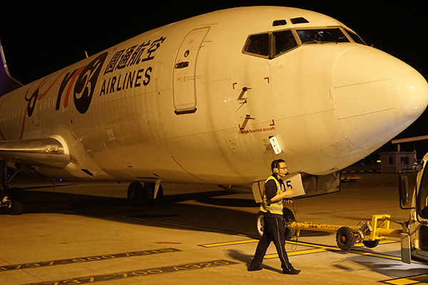 A Shanghai YTO Express (Logistics) Co Ltd aircraft gets ready to take off at Xiaoshan airport in Hangzhou, Zhejiang province. YTO plans to expand its air cargo operations in the future. It is already the largest express delivery business by market share in China. (Photo provided to China Daily)