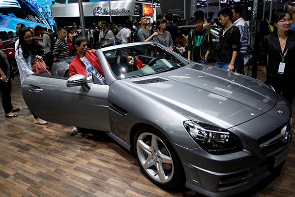 China's car sales will continue to surge in the coming year due to reduced tax and economic development.(ZOU ZHONGPIN / CHINA DAILY)