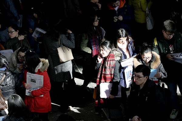 More than 18,000 positions were provided during a job fair for graduating students in Beijing on Tuesday. Wang Zhuangfei / China Daily