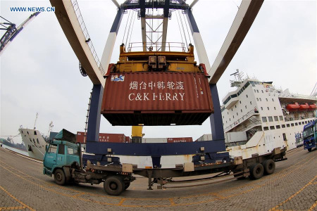 South Korean goods arrive at the harbor of Yantai, east China's Shandong Province, Dec. 20, 2015. The China-South Korea Free Trade Agreement came into effect on Sunday. (Xinhua/Tang Ke)