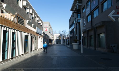 A man walks down Beijing's Zhongguancun Inno Way, a hub for entrepreneurs in the city's Haidian District. The area has become less popular as the capital market has cooled. (Photo: Global Times/Chen Qingqing)