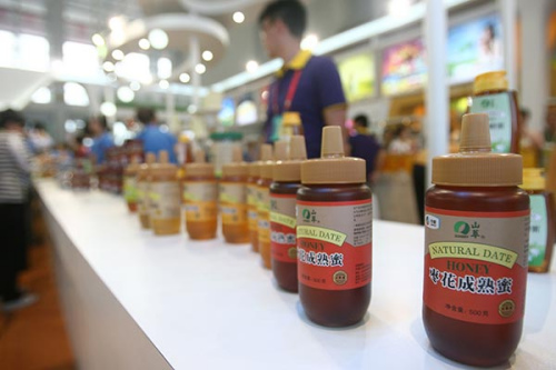 The stand of COFCO at an industry expo in Ningbo, Zhejiang province. (Provided to China Daily)
