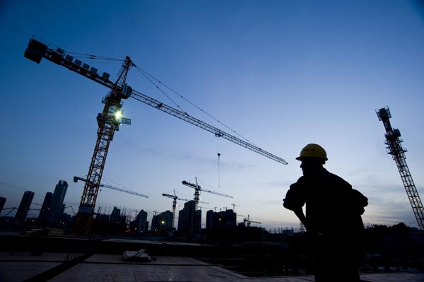 A residential project is under construction in Huai'an, Jiangsu province. (File Photo/China Daily)