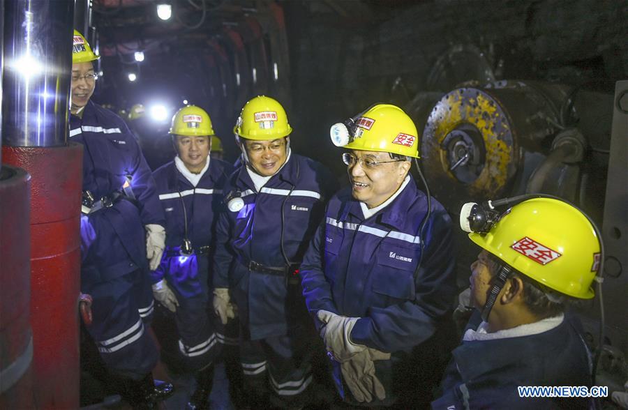 Chinese Premier Li Keqiang (2nd R) inspects the Guandi mine of Xishan Coal Electricity Group Co.Ltd, in north China's Shanxi Province, Jan. 5, 2016. Li had an inspection tour in Taiyuan, capital of north China's Shanxi Province on Jan. 4 and Jan. 5. (Photo: Xinhua/Xie Huanchi) 