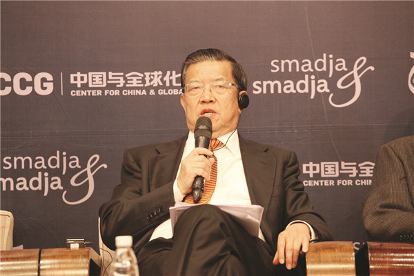 Long Yongtu, former vice-minister of commerce, said that the trend of Chinese companies going overseas is irreversible.Photo: China Daily/Chen Yingqun