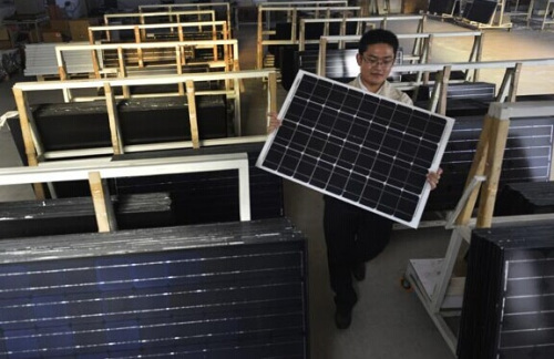 Storehouse of a solar product producer in Shandong province. (Photo/China Daily)