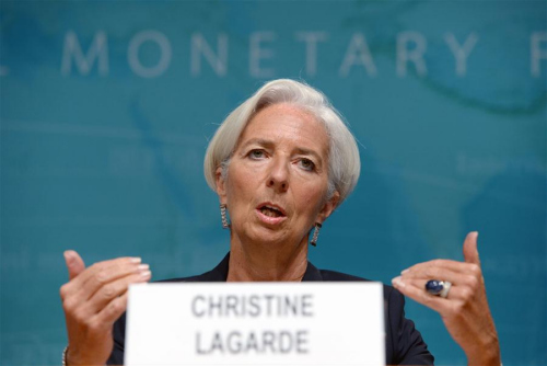 File photo taken on June 16, 2014 shows International Monetary Fund(IMF) Managing Director Christine Lagarde speaking during a press conference at the IMF headquarters in Washington D.C., the United States. (Photo: Xinhua/Yin Bogu)