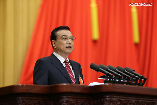 Chinese Premier Li Keqiang delivers a government work report during the opening meeting of the fourth session of the 12th National People's Congress at the Great Hall of the People in Beijing, capital of China, March 5, 2016. (Photo: Xinhua/Liu Weibing) 