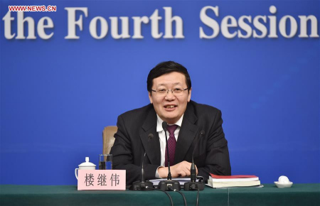 Chinese Minister of Finance Lou Jiwei gives a press conference on the sidelines of the fourth session of China's 12th National People's Congress at the press center in Beijing, capital of China, March 7, 2016. (Photo: Xinhua/Li Xin) 