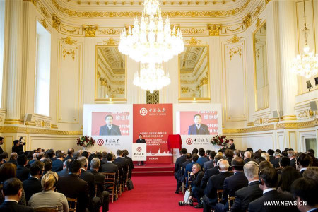  Photo taken on March 8, 2016 shows a view of the opening ceremony of Bank of China (Hungary) Close Ltd. Vienna Branch in Vienna, capital of Austria. (Photo: Xinhua/Qian Yi)