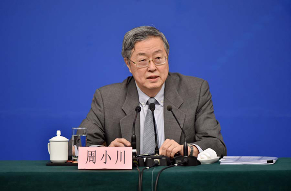 Zhou Xiaochuan, governor of the People's Bank of China, answers questions at a press conference on the financial reform and development on the sidelines of the fourth session of the 12th National People's Congress in Beijing, capital of China, March 12, 2016. (Xinhua/LiXin)