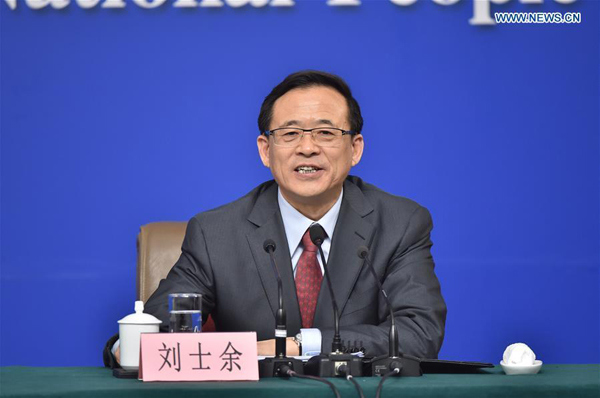 Chairman of the China Securities Regulatory Commission Liu Shiyu answers questions at a press conference on the sidelines of the fourth session of the 12th National People's Congress in Beijing, capital of China, March 12, 2016. (Xinhua/Li Xin)