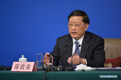 Minister of Housing and Urban-Rural Development Chen Zhenggao answers questions at a press conference on rebuilding shantytowns and real estate development on the sidelines of the fourth session of the 12th National People's Congress in Beijing, capital of China, March 15, 2016. (Xinhua/Li Xin)