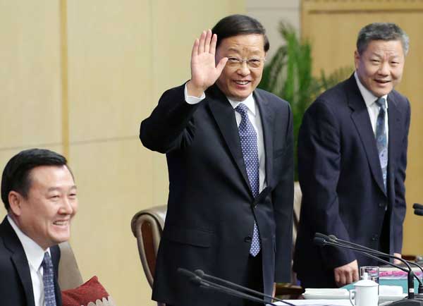 Minister of Housing and Urban-Rural Development Chen Zhenggao (center) addresses a news conference on Tuesday during the NPC annual session. WANG ZHUANGFEI / CHINA DAILY
