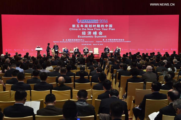 Guests attend the Economic Summit of China Development Forum 2016 in Beijing, capital of China, March 19, 2016. The three-day China Development Forum 2016 kicked off here Saturday. (Photo: Xinhua/Li Xin)