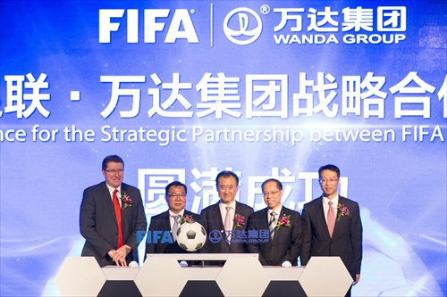 Wanda announced a sponsorship agreement with FIFA at a conference held in Beijing on Monday. (Photo/Courtesy of Wanda)
